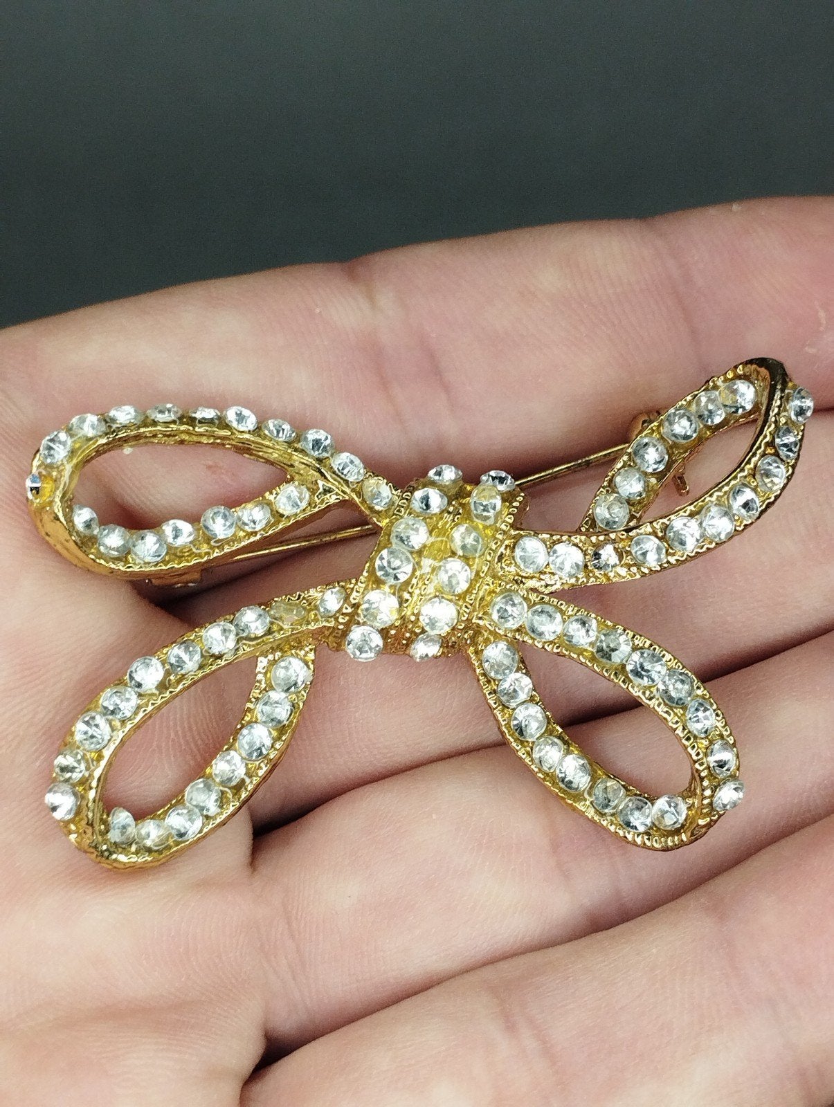 prachtige vintage strikbroche, Ophalen of Verzenden, Zo goed als nieuw, Zilver, Overige materialen