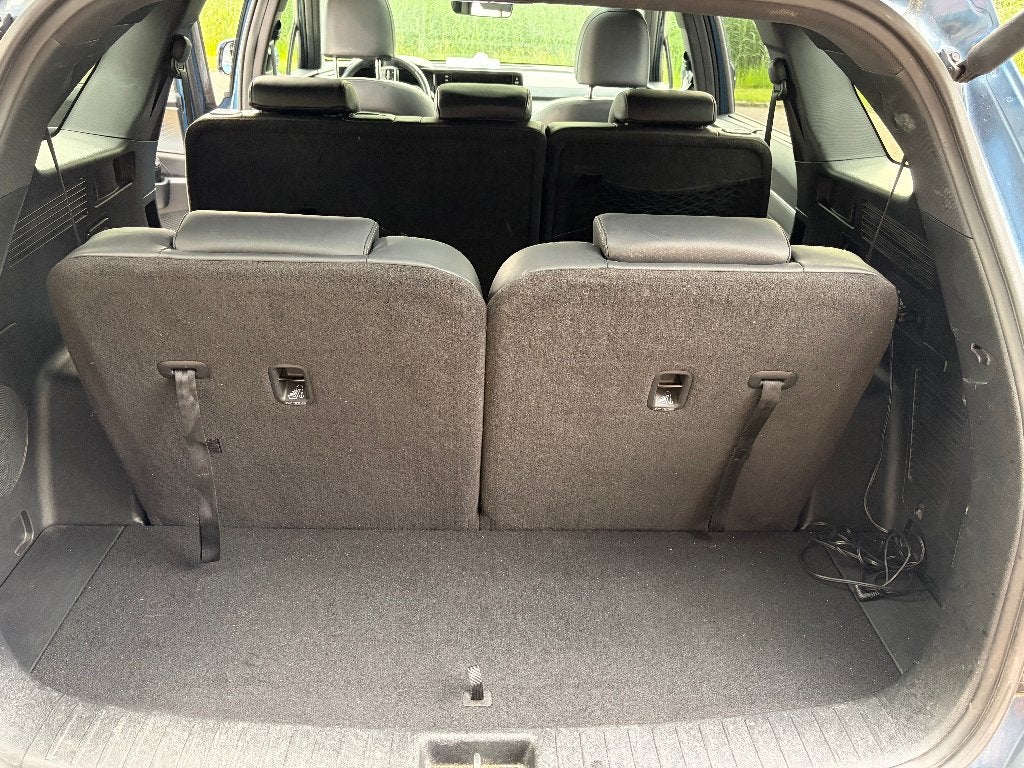 Kia Sorento 1.6 265pk Phev 4WD Aut 2023 Executive 7P, Auto's, Kia, Zwart, 4 cilinders, Blauw, 7 stoelen