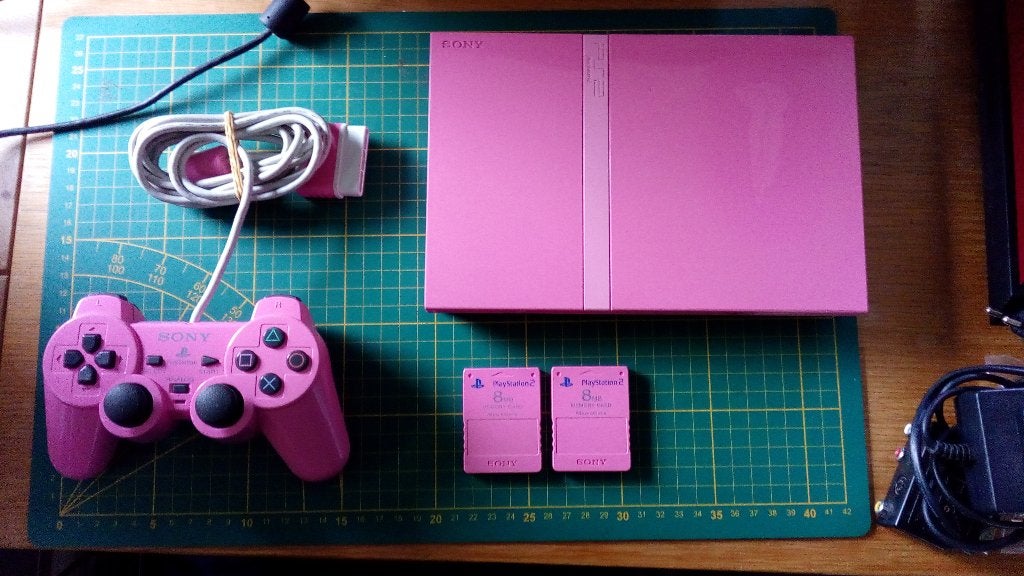 playstation 2 slim roze, Spelcomputers en Games, Ophalen of Verzenden, Zo goed als nieuw, Roze, Met geheugenkaart