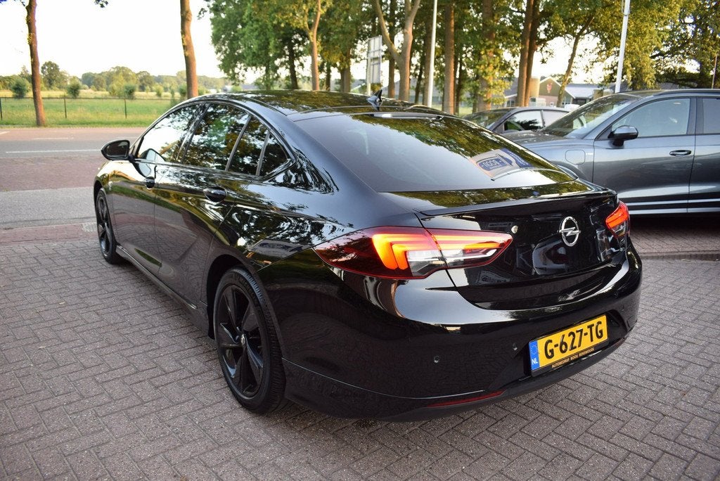 Opel Insignia Grand Sport 1.5 Turbo Exclusive OPC/ADAP CRUIS, Auto's, Opel, Gebruikt, 4 cilinders, 700 kg, Zwart