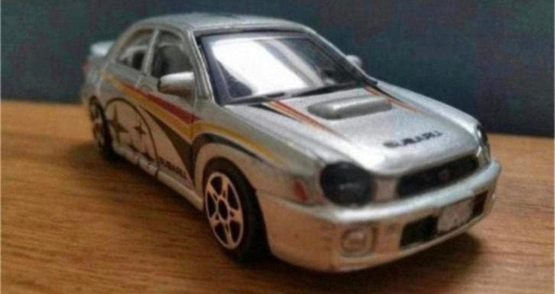 Bburago Subaru Impreza WRX STI Street Fire 1:43 zilver, Ophalen of Verzenden, Gebruikt, Auto, Overige merken