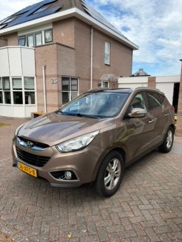 Hyundai iX35 2.0i Cvvt 163pk 2012 Bruin, Auto's, Hyundai, Particulier, iX35, ABS, Airconditioning, Bluetooth, Boordcomputer, Centrale vergrendeling