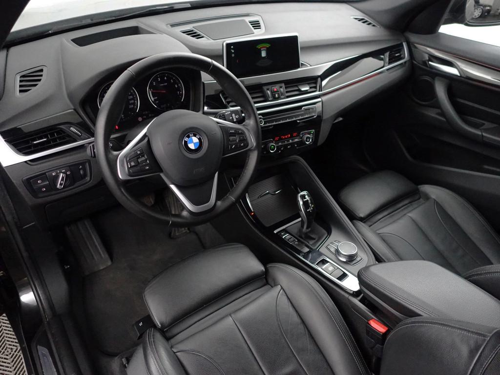 BMW X1 sDrive20i High Executive Aut- NAP 130dkm Dealer Onder, Auto's, 1998 cc, Met garantie (alle), Zwart, Bedrijf