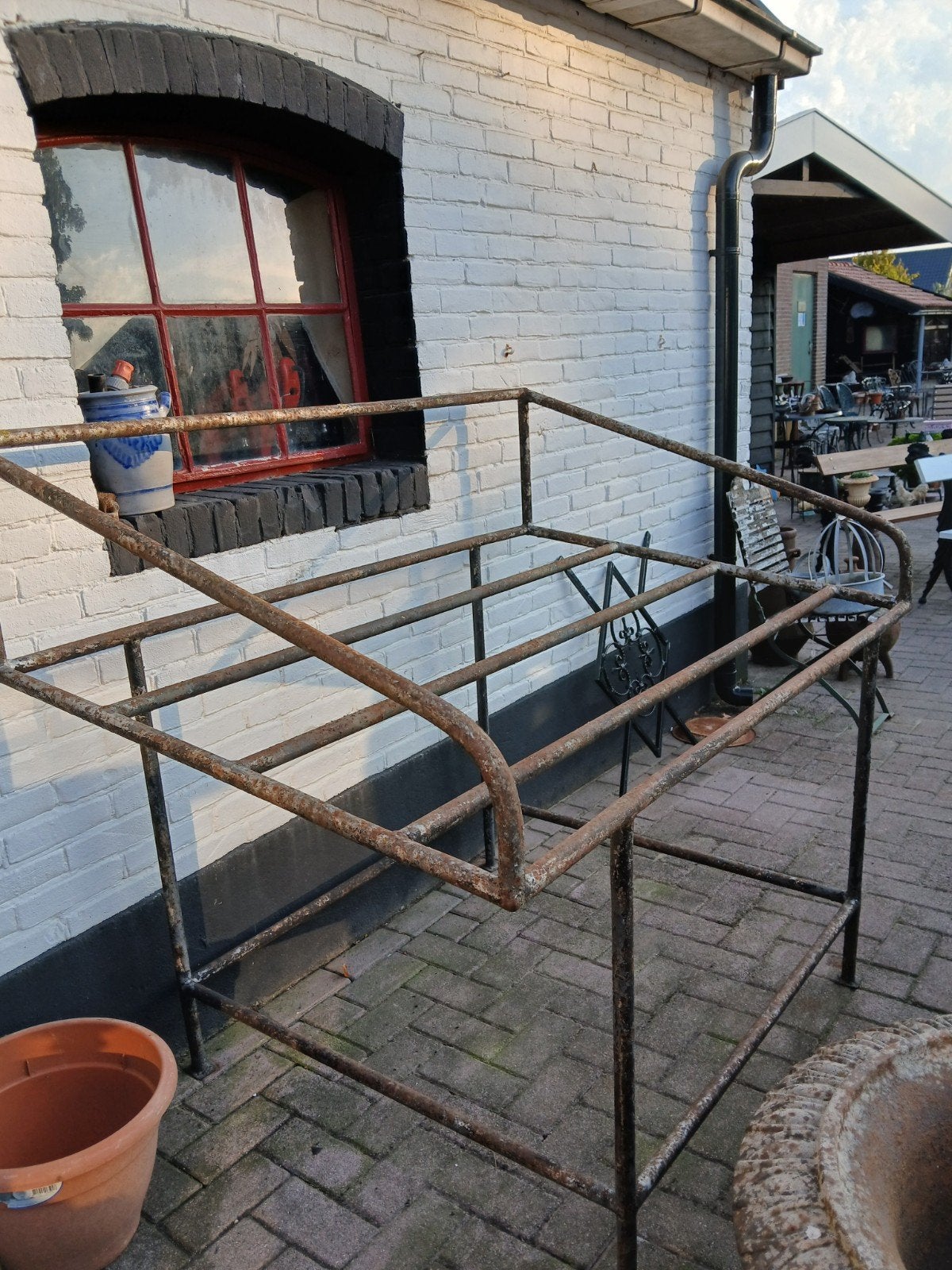 oud melkbussen rek, Ophalen, Gebruikt