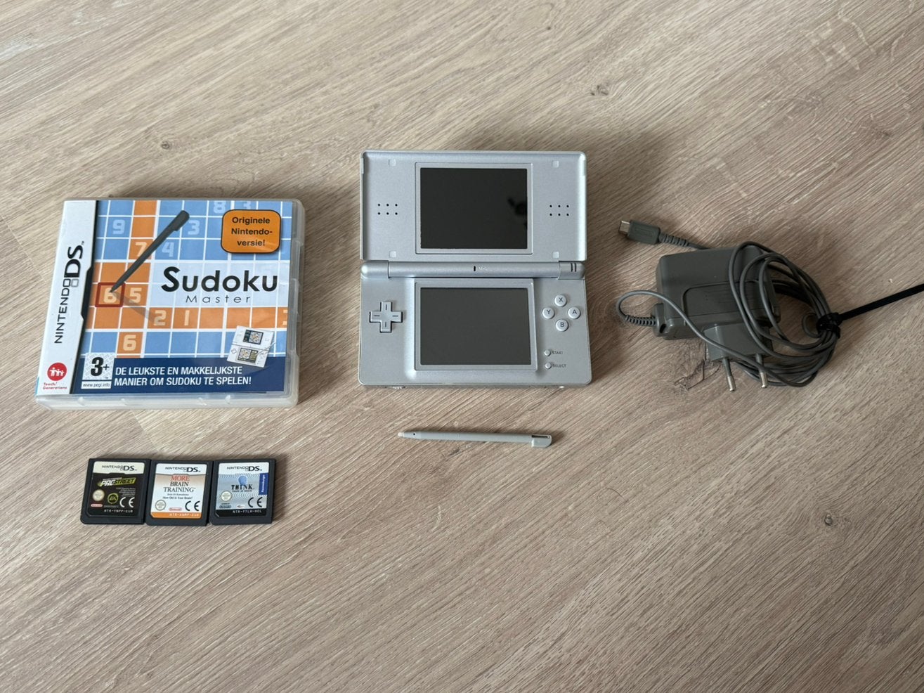 Nintendo DS Lite - NIEUWSTAAT, Ophalen of Verzenden, Zo goed als nieuw, Zilver, DS Lite