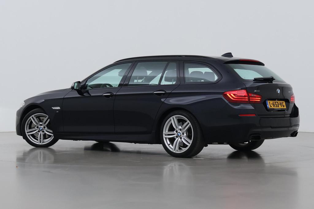 BMW 5-serie Touring M550xd | M-Sport | Panoramadak | Stoelve, Auto's, BMW, Automaat, Gebruikt, Zwart, Leder