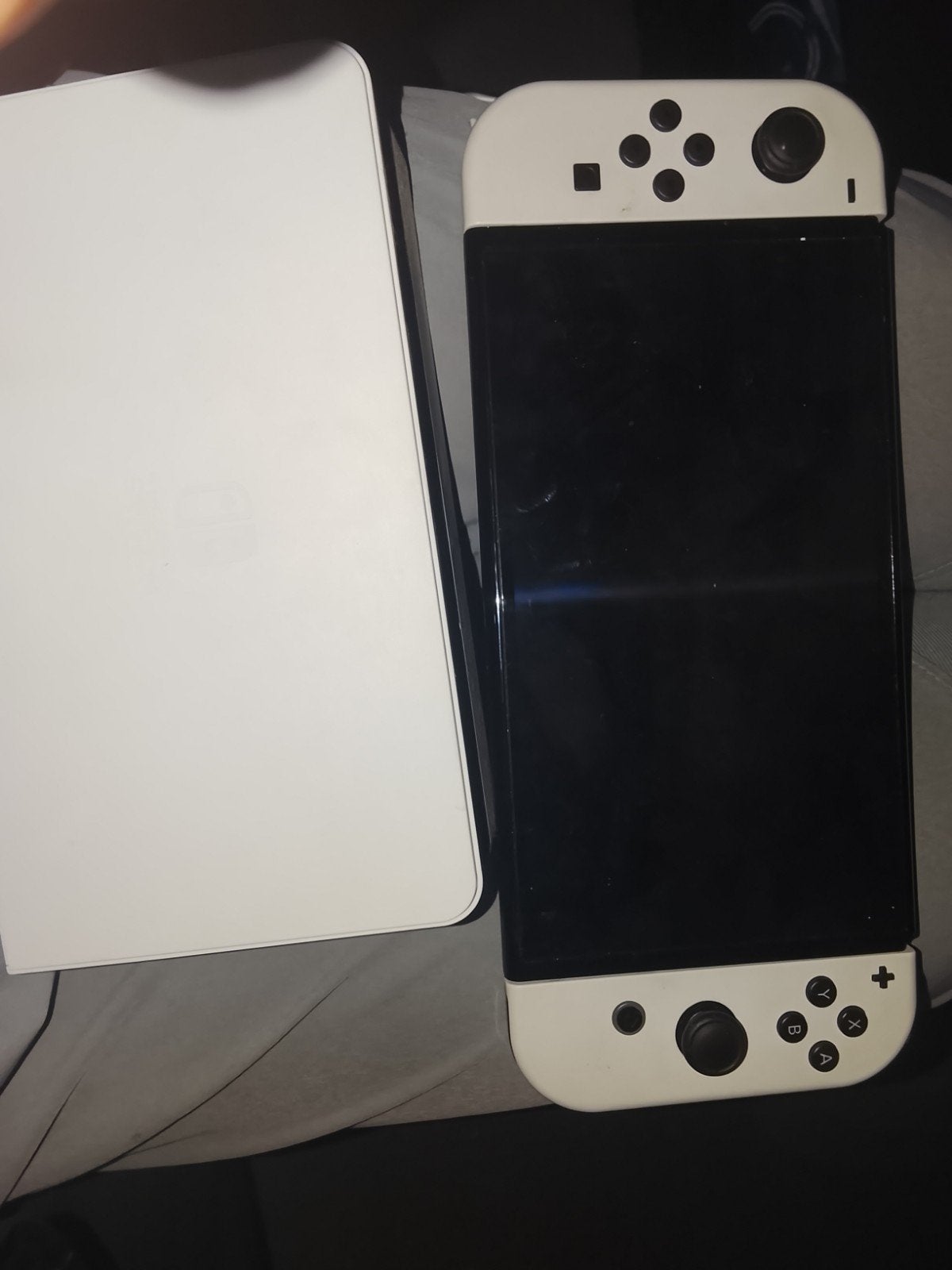 Nieuwe Nintendo Switch OLED met 2 extra stuurtjes, Spelcomputers en Games, Ophalen of Verzenden, Zo goed als nieuw