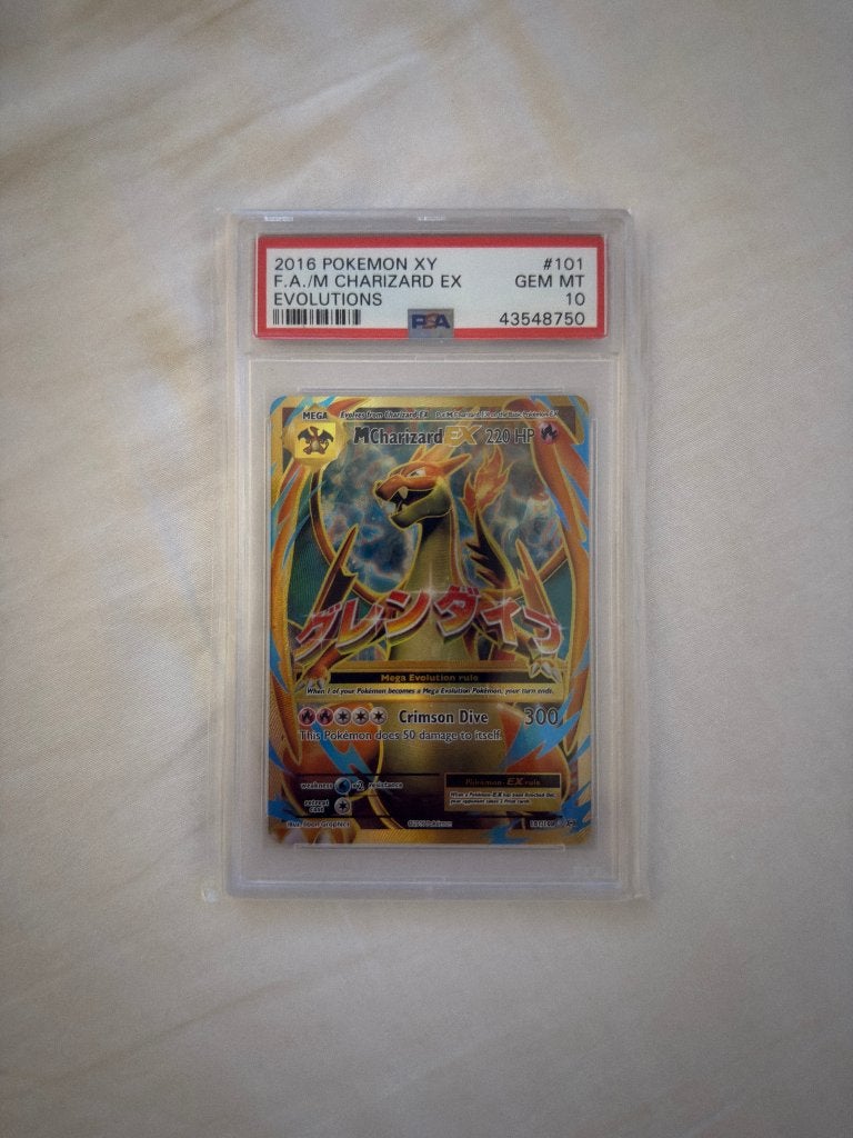 M CHARIZARD EX 101 PSA 10, Hobby en Vrije tijd, Verzamelkaartspellen | Pokémon, Ophalen of Verzenden, Zo goed als nieuw, Losse kaart