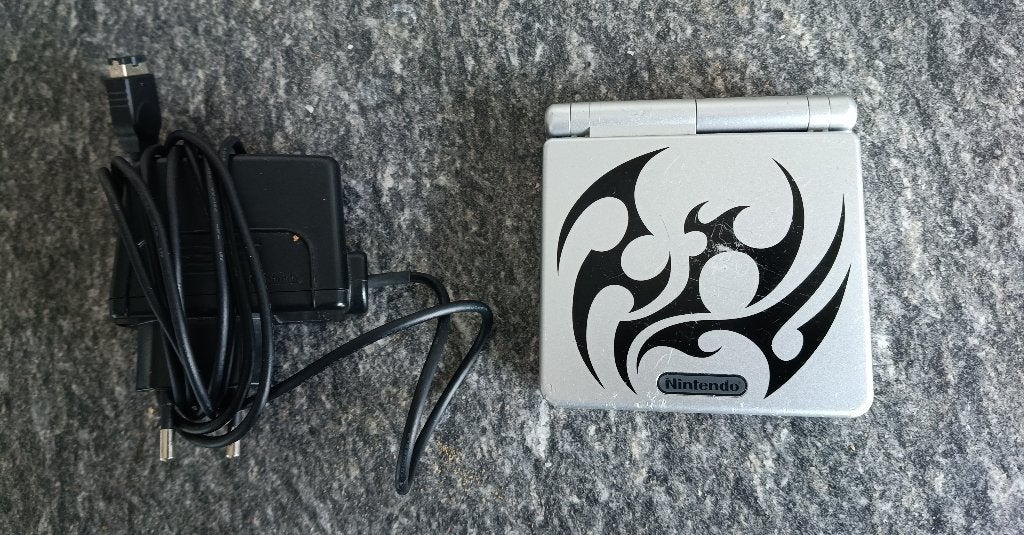 gameboy advance sp tribal, Spelcomputers en Games, Ophalen, Gebruikt, Game Boy Advance SP