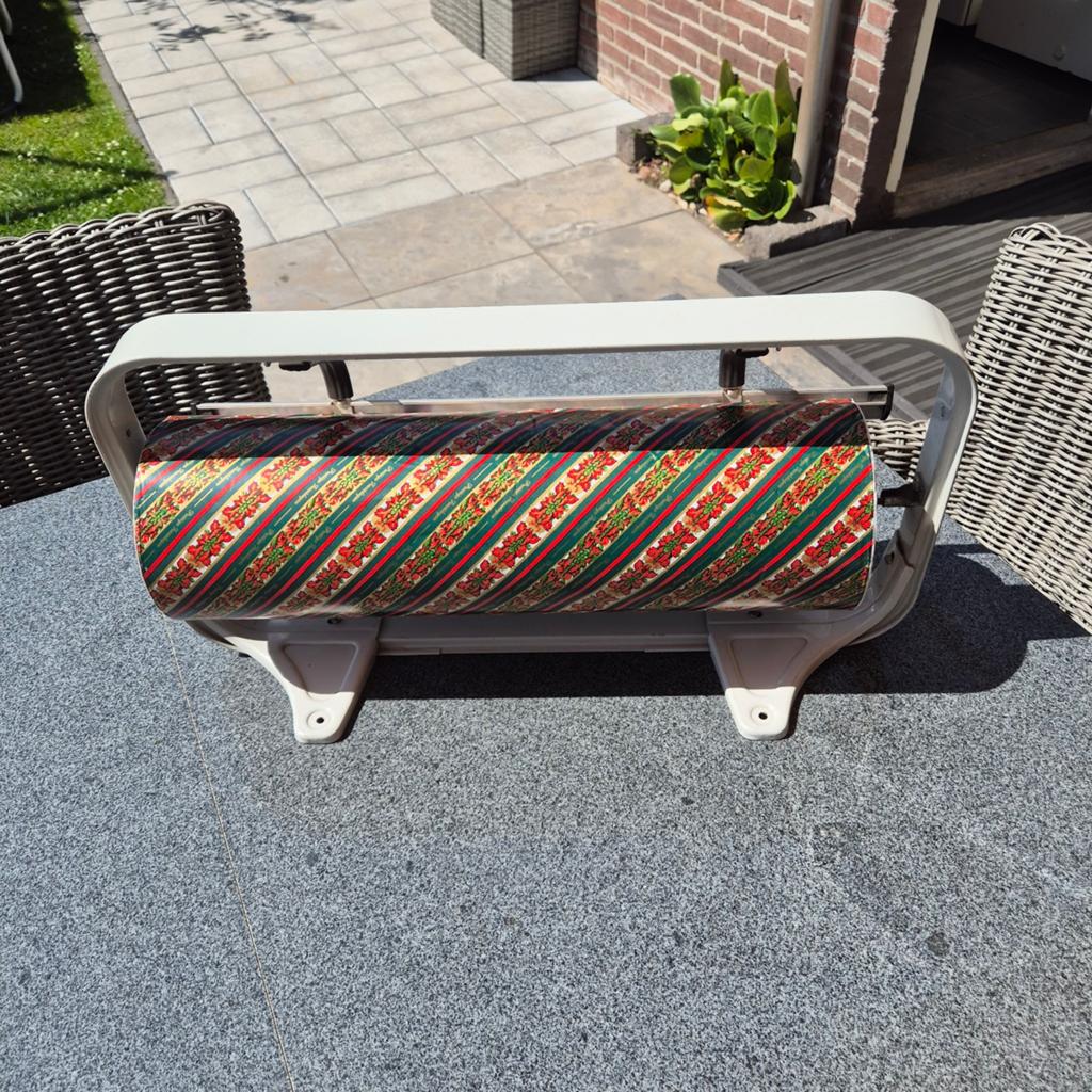 Houder met cadopapier te koop, Ophalen