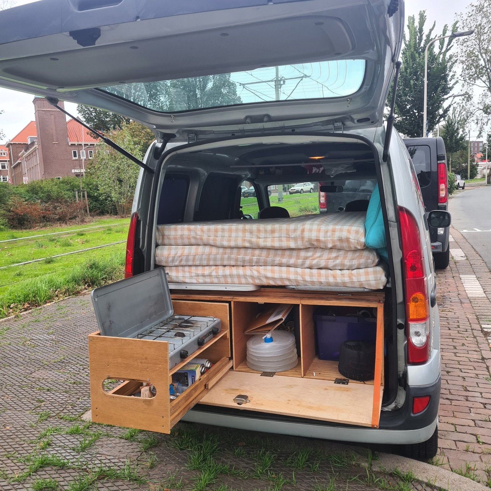 Minicamper Renault Kangoo 1.2 16V - Airco en Groot onderhoud, Buscamper of Camperbus, Bestuurdersdeur, Tot en met 2, Treinzit