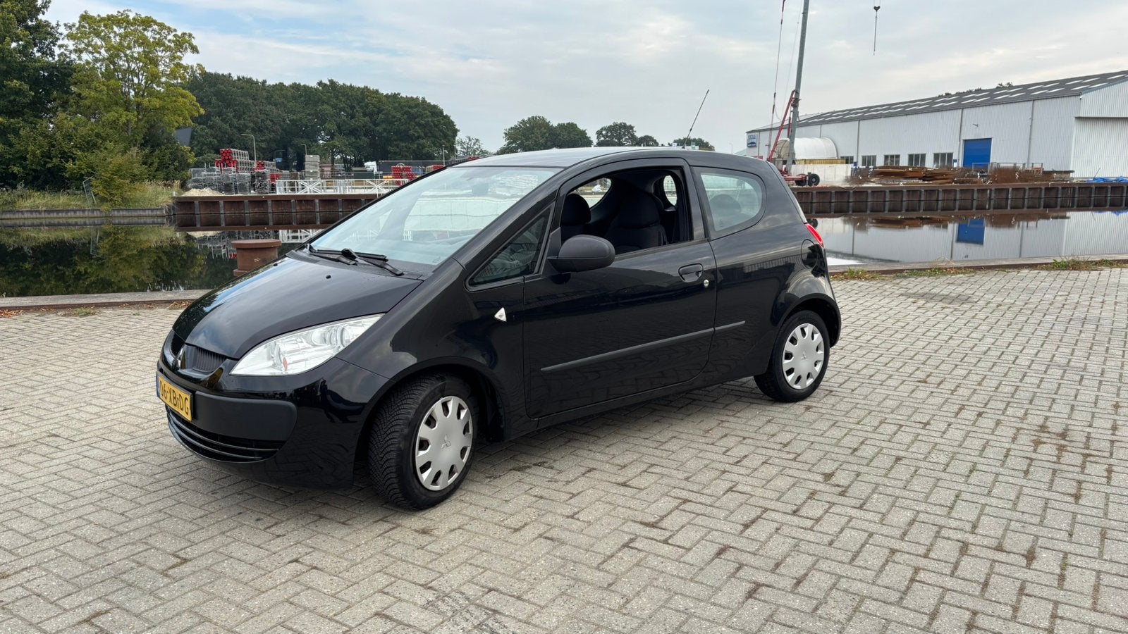 Mitsubishi Colt 1.1 CZ3 2007 Zwart, Auto's, Voorwielaandrijving, 74 pk, Origineel Nederlands, Handgeschakeld