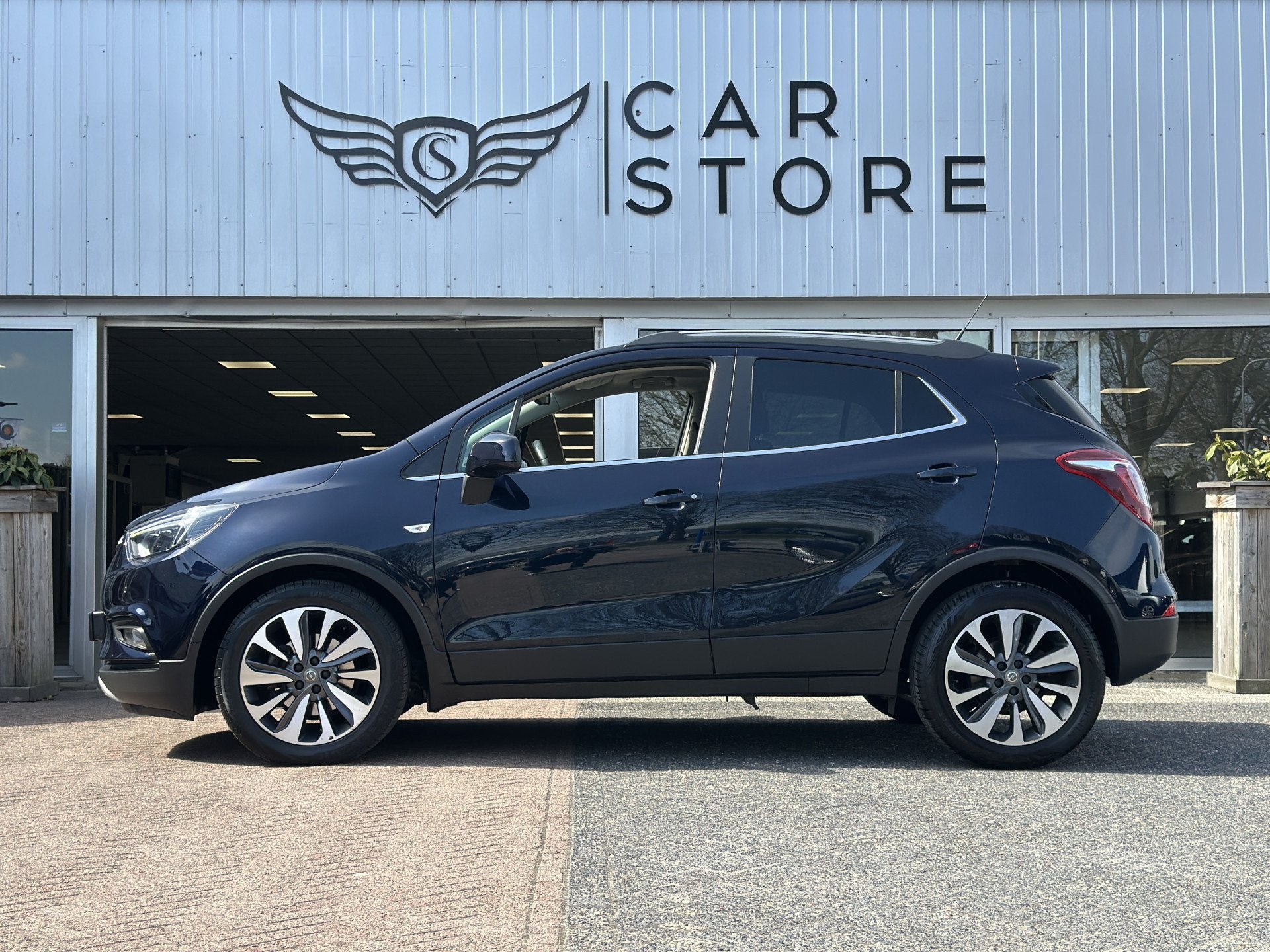 Opel Mokka X 1.4 Turbo 120 Jaar Edition |CARPLAY|CRUISE|CAME, Auto's, Voorwielaandrijving, Gebruikt, Euro 6, Blauw