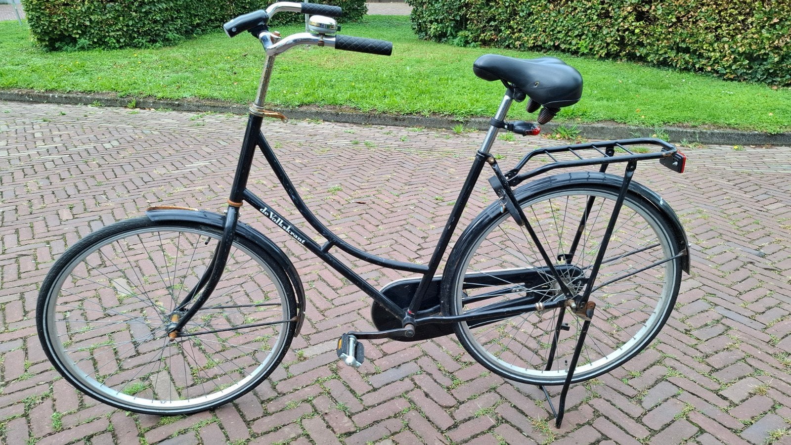 Zwarte damesfiets met lage instap en bagagedrager, Terugtraprem, Ophalen, Overige merken, 53 tot 56 cm