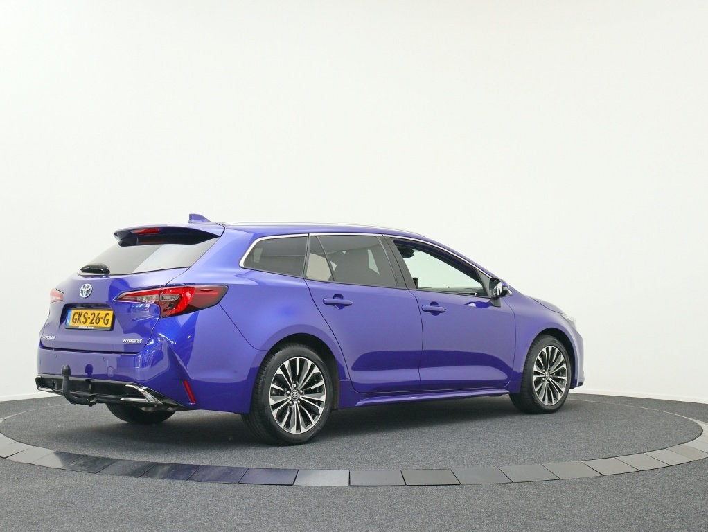 Toyota Corolla Touring Sports Hybrid 140 Business Plus | Tre, Auto's, Automaat, Gebruikt, 4 cilinders, Blauw