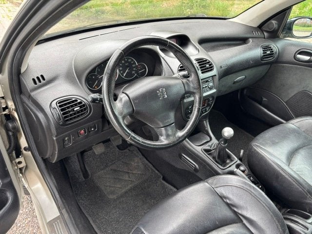 Peugeot 206 1.6-16V Griffe 5-Drs ECC Audio-CD Leder Sportsto, Voorwielaandrijving, Automatische klimaatregeling, Zwart, 4 cilinders