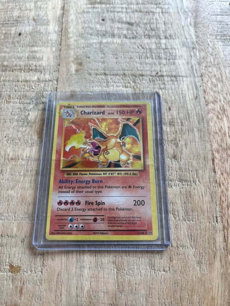 Charizard base set (evolutions 2016), Hobby en Vrije tijd, Verzamelkaartspellen | Pokémon, Ophalen of Verzenden, Gebruikt