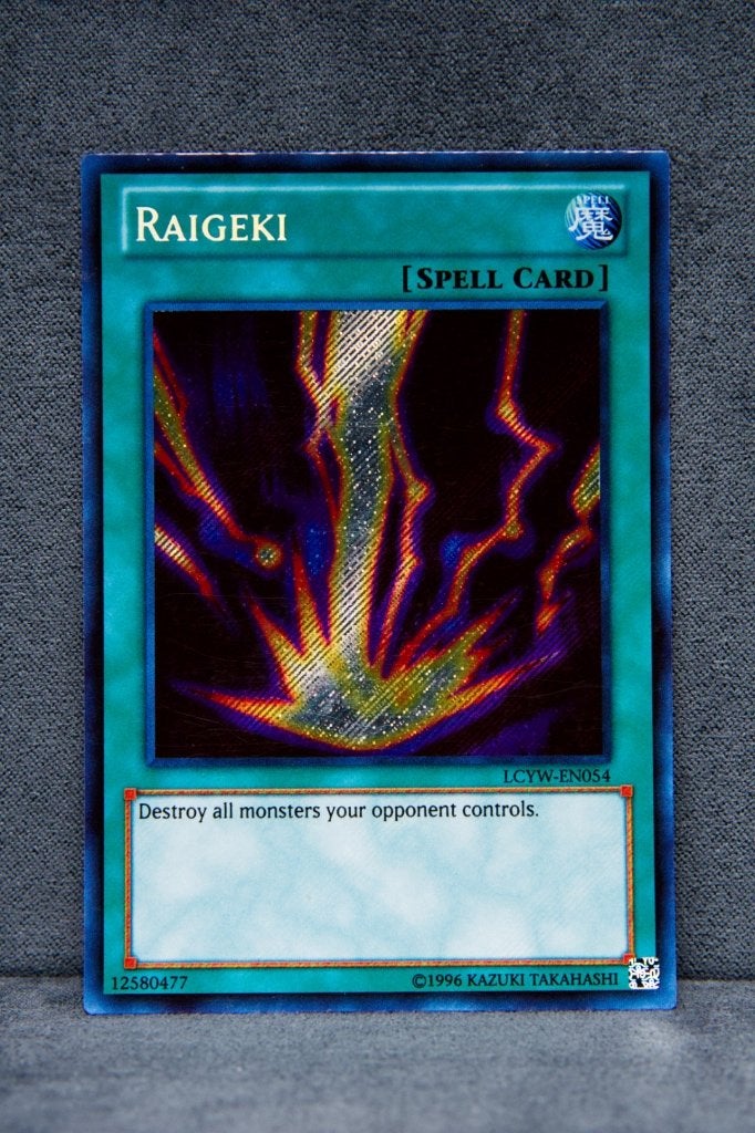 Yu-Gi-Oh! Raigeki LCYW-EN054 Secret Rare NM, Ophalen of Verzenden, Zo goed als nieuw, Losse kaart, Foil