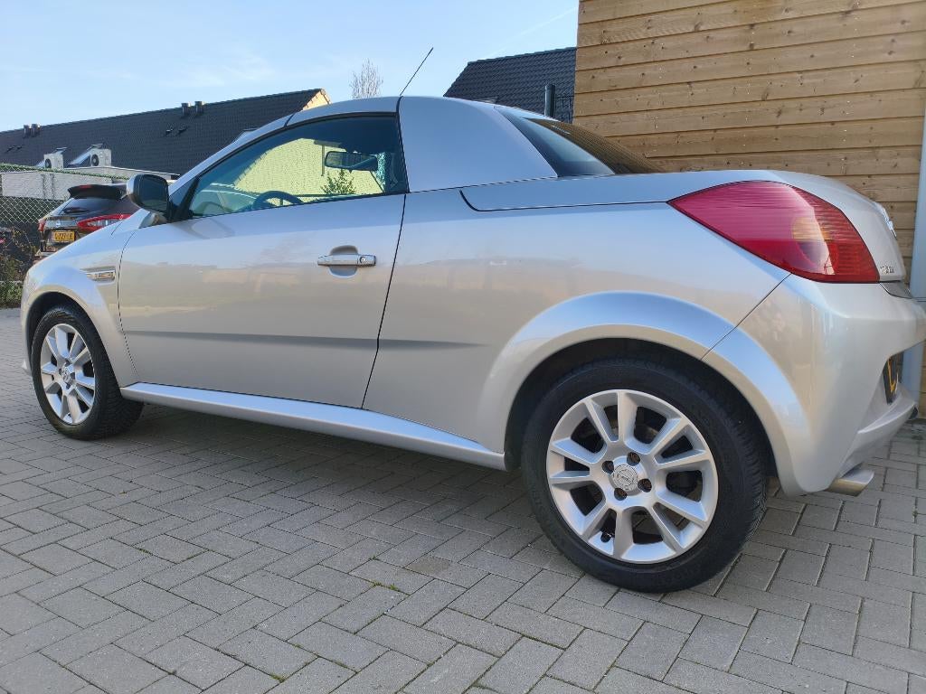 Opel Tigra 1.8 16V Twintop 2006 Grijs, Auto's, Opel, 125 pk, Zwart, 4 cilinders, Handgeschakeld