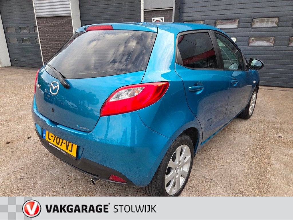 Mazda 2 1.3 Cool Nette auto, Weinig Kilometers, Airco., Auto's, Mazda, Voorwielaandrijving, Euro 5, Zwart, 4 cilinders