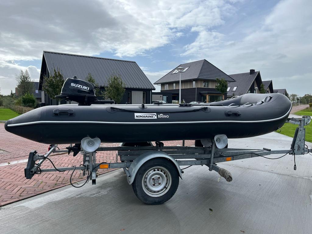 Rhino Nimarine Rubberboot met Suzuki motor 6 PK, Ophalen, Zo goed als nieuw, Benzine, Airdeck