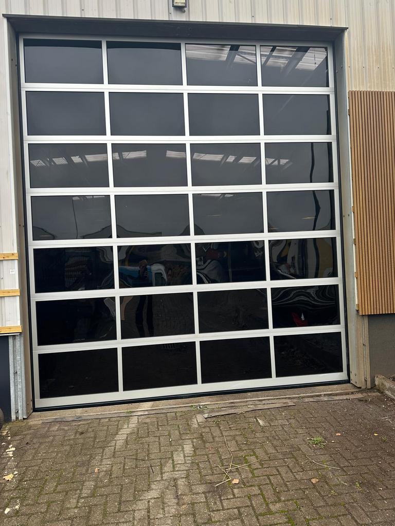Garagedeur, roldeur, industriedeur, overheaddeur vervangen?, Gebruikt, Garagedeur, Ophalen of Verzenden, 120 cm of meer