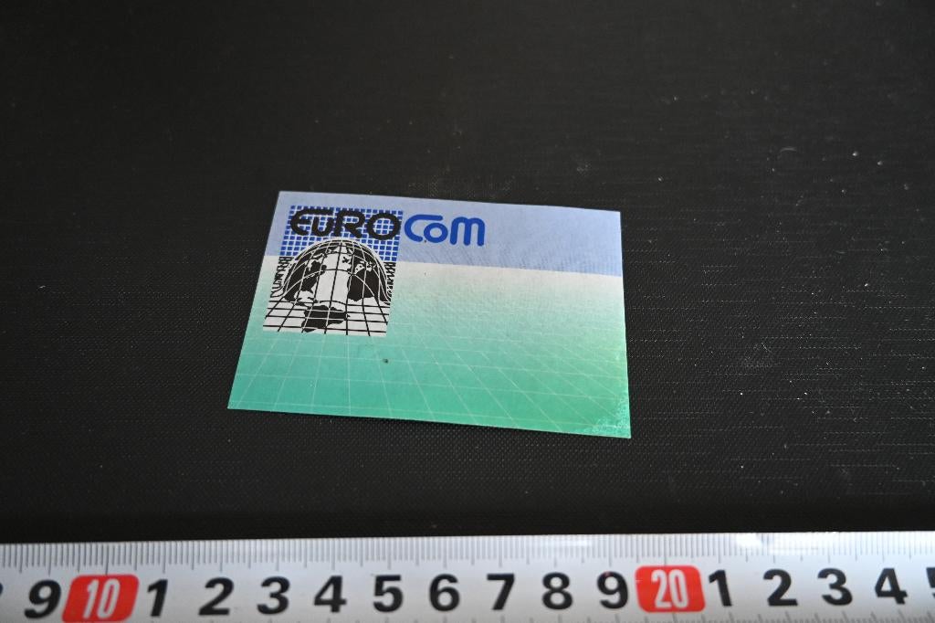 sticker EuroCom, Ophalen, Zo goed als nieuw