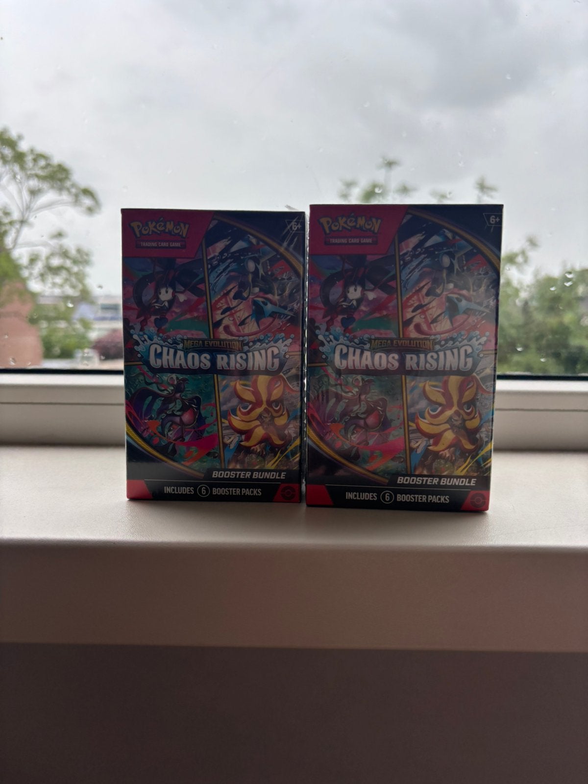 Chaos rising Boosterbundle(sealed), Ophalen of Verzenden, Zo goed als nieuw