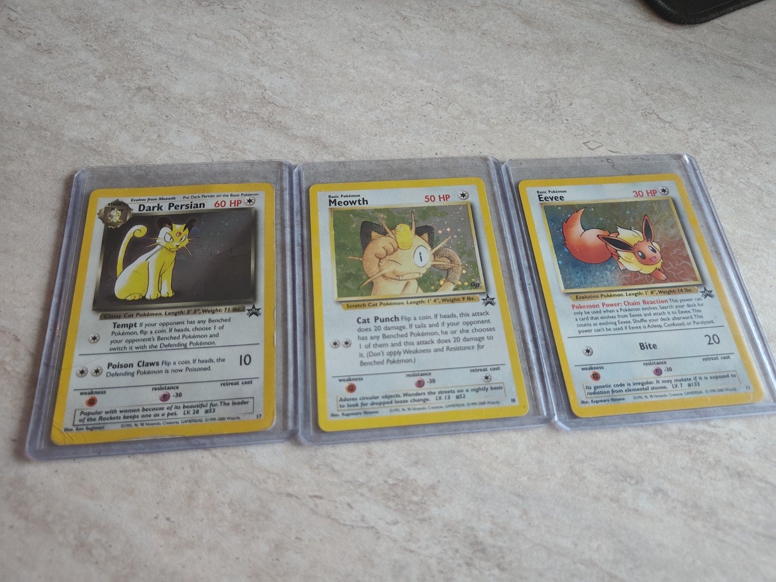 Pokémon vintage promo holo: Dark Persian, Meowth, Eevee, Ophalen of Verzenden, Zo goed als nieuw, Meerdere kaarten, Foil