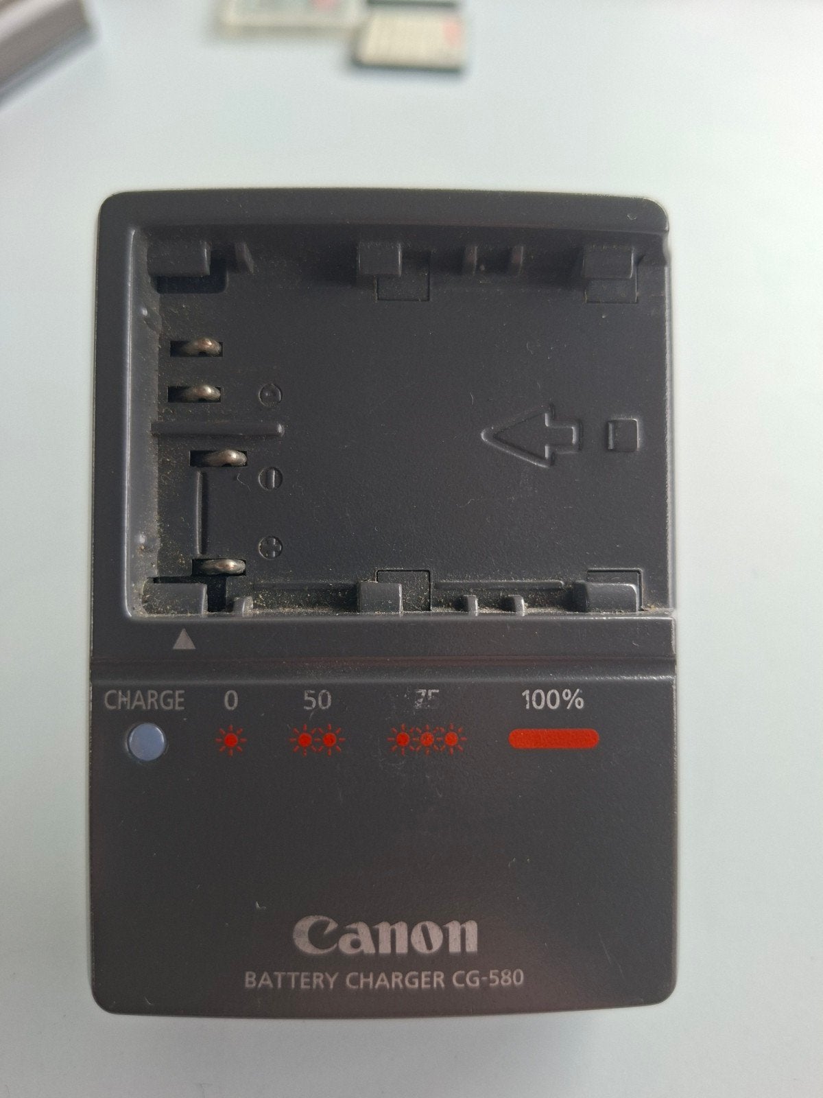 Canon Batterijlader CG-580 voor camera accu's, Ophalen of Verzenden