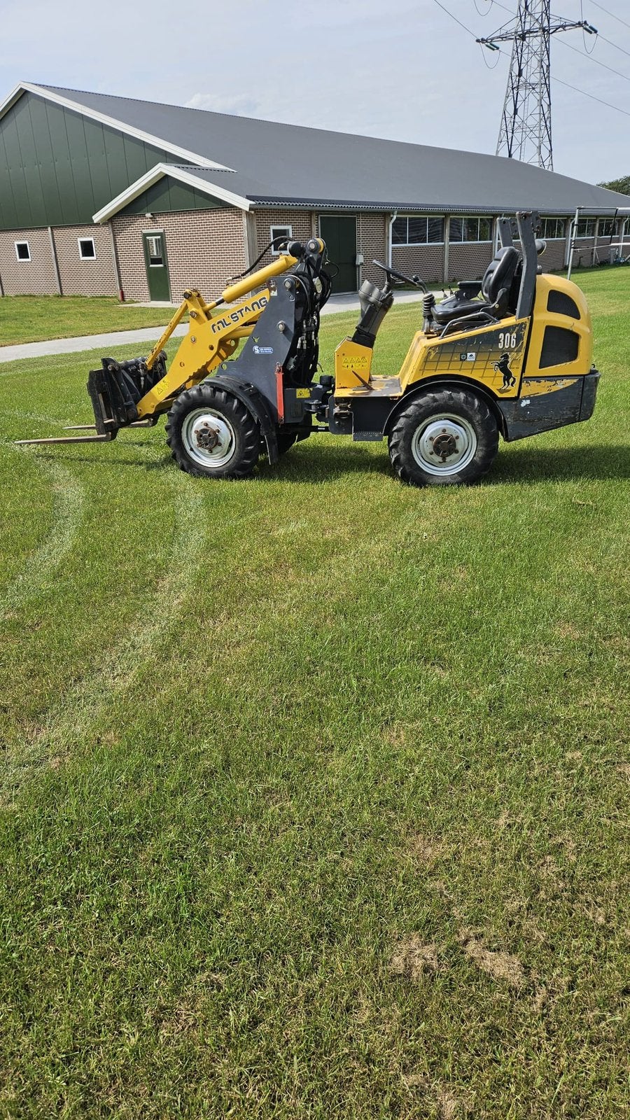 Mustang 306 minishovel, Ophalen, Transport