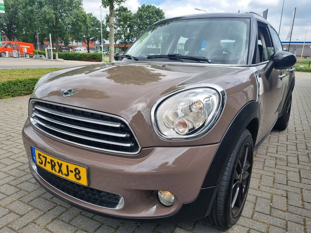 Mini Countryman 1.6 Cooper Chili Navi Leder Clima, Auto's, Voorwielaandrijving, Euro 5, Gebruikt, Zwart
