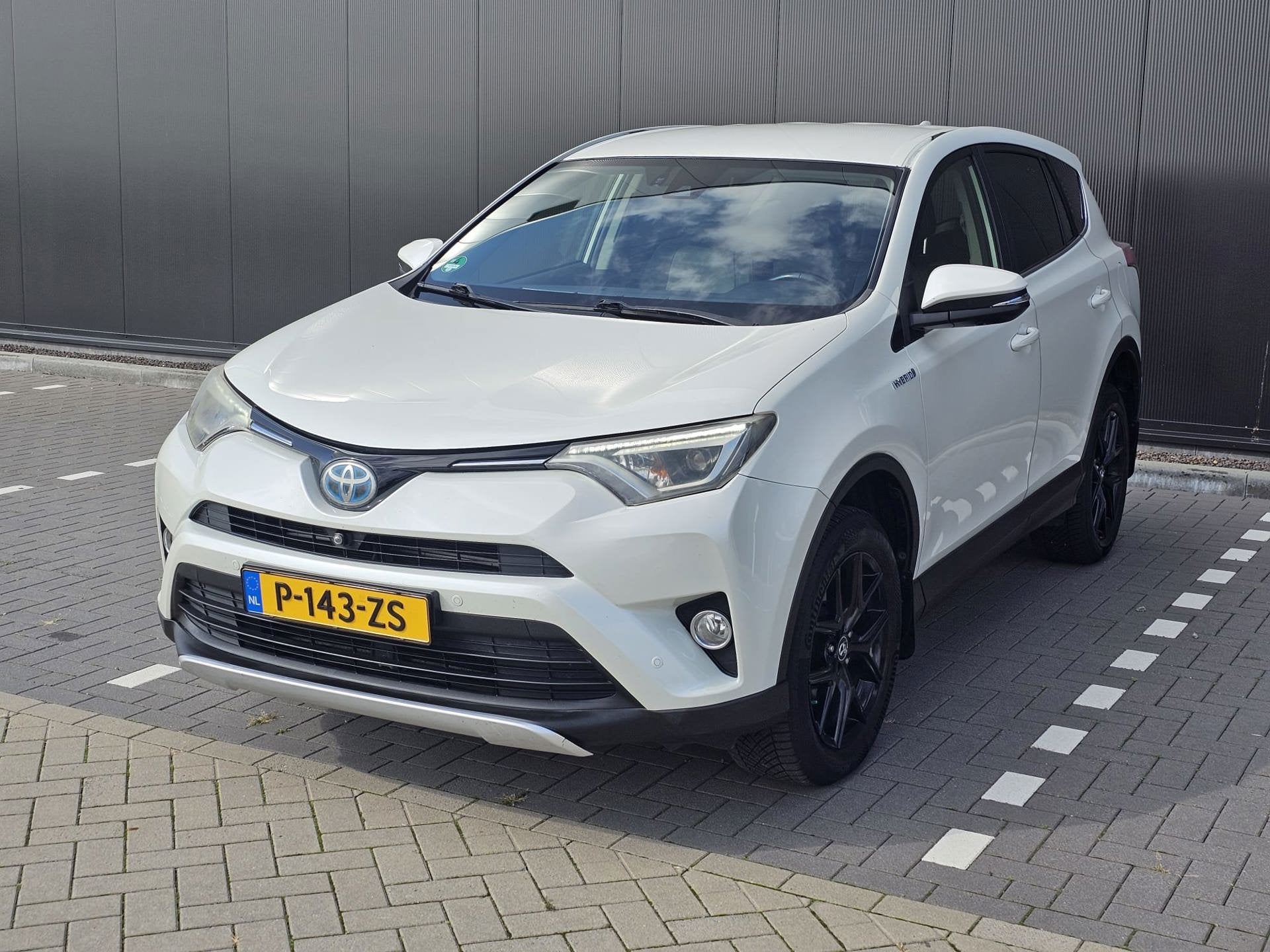 Toyota RAV4 2.5 Hybrid Style Automaat, Auto's, Stoelverwarming, Gebruikt, Euro 6, Wit