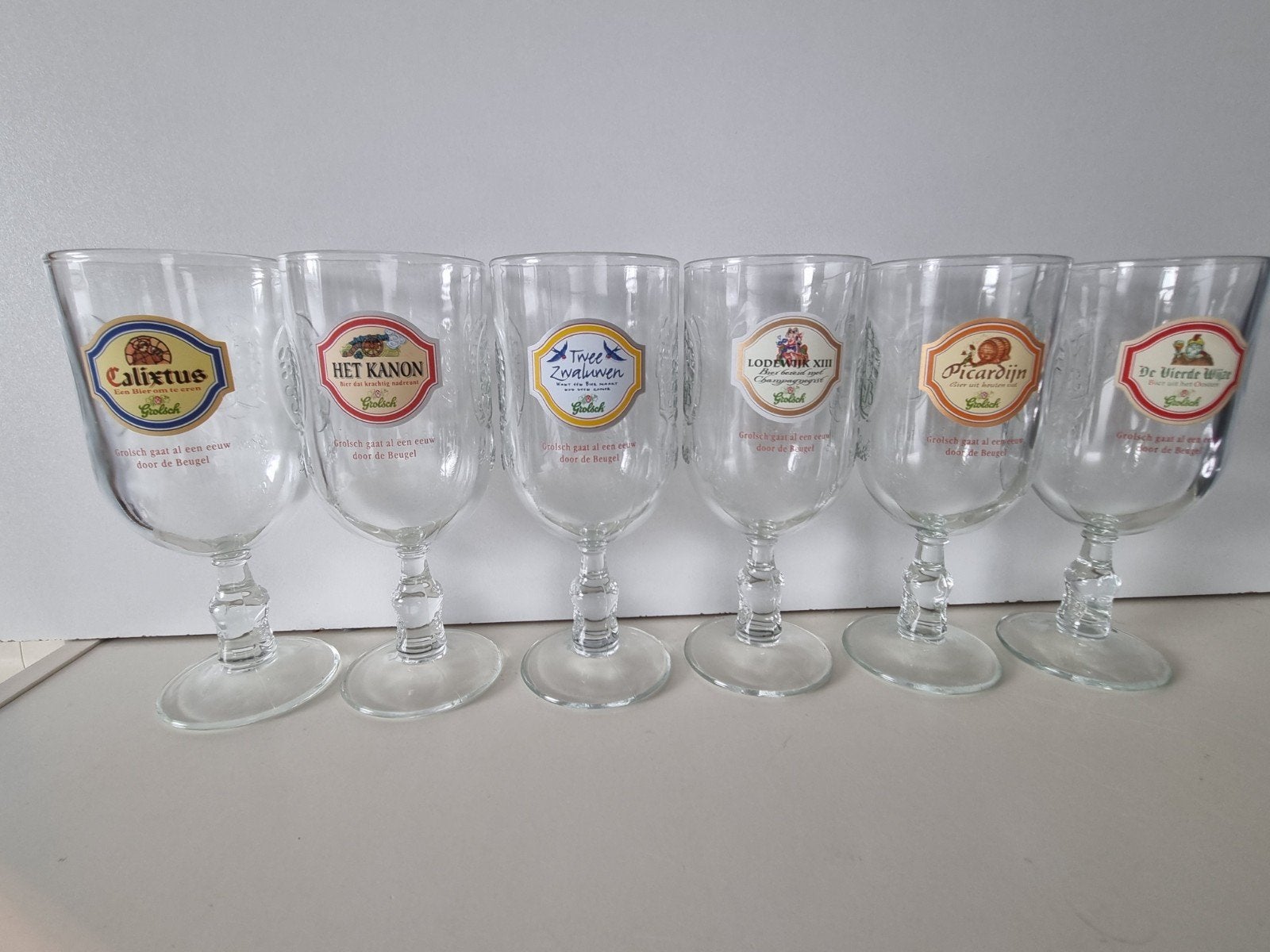 Grolsch 6 glazen ivm 100 jarige jubileum van de beugelfles, Ophalen, Nieuw, Glas of Glazen, Grolsch