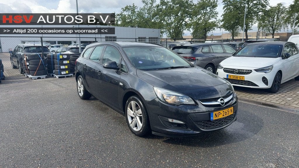 Opel Astra Sports Tourer 1.4 Turbo Business + airco LM *123., Auto's, Opel, Voorwielaandrijving, Euro 5, 15 km/l, Gebruikt