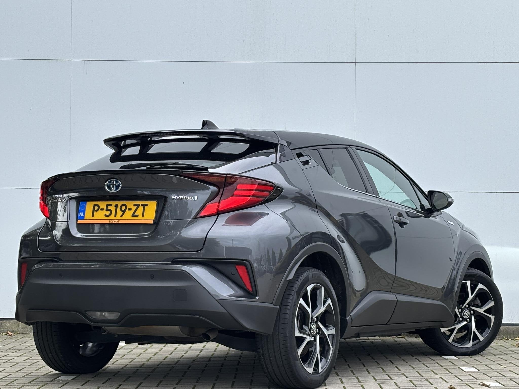 Toyota C-HR 1.8 Hybrid Executive Navigatie / Climate Control, Auto's, Euro 6, 4 cilinders, Leder en Stof, 122 pk