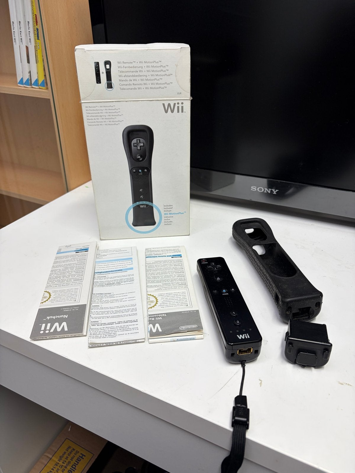 Wii Remote + Wii MotionPlus Zwart - Zo goed als nieuw, Geen, Ophalen of Verzenden, Zo goed als nieuw, Geen