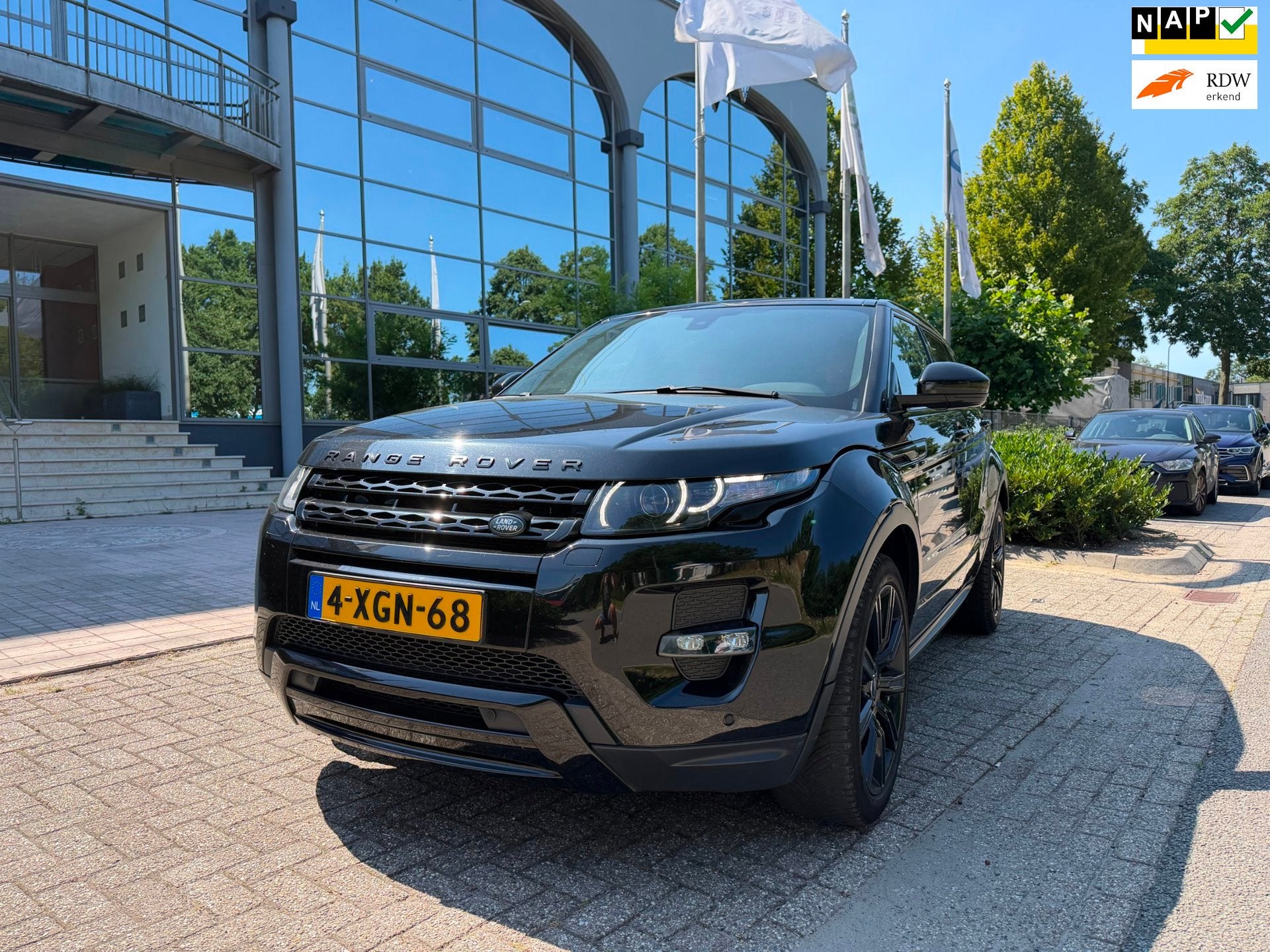 Land Rover Range Rover Evoque 2.0 Si 4WD Prestige leer,navi,, Auto's, Land Rover, Euro 5, 4 cilinders, Zwart, Bedrijf