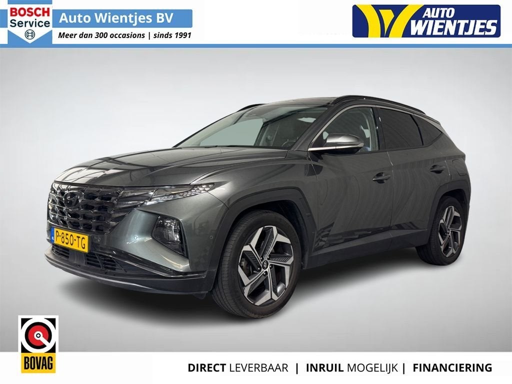 Hyundai Tucson 1.6 T-GDI HEV | Premium Sky | Pano | Leer | N, Auto's, Gebruikt, Euro 6, 4 cilinders, 179 pk