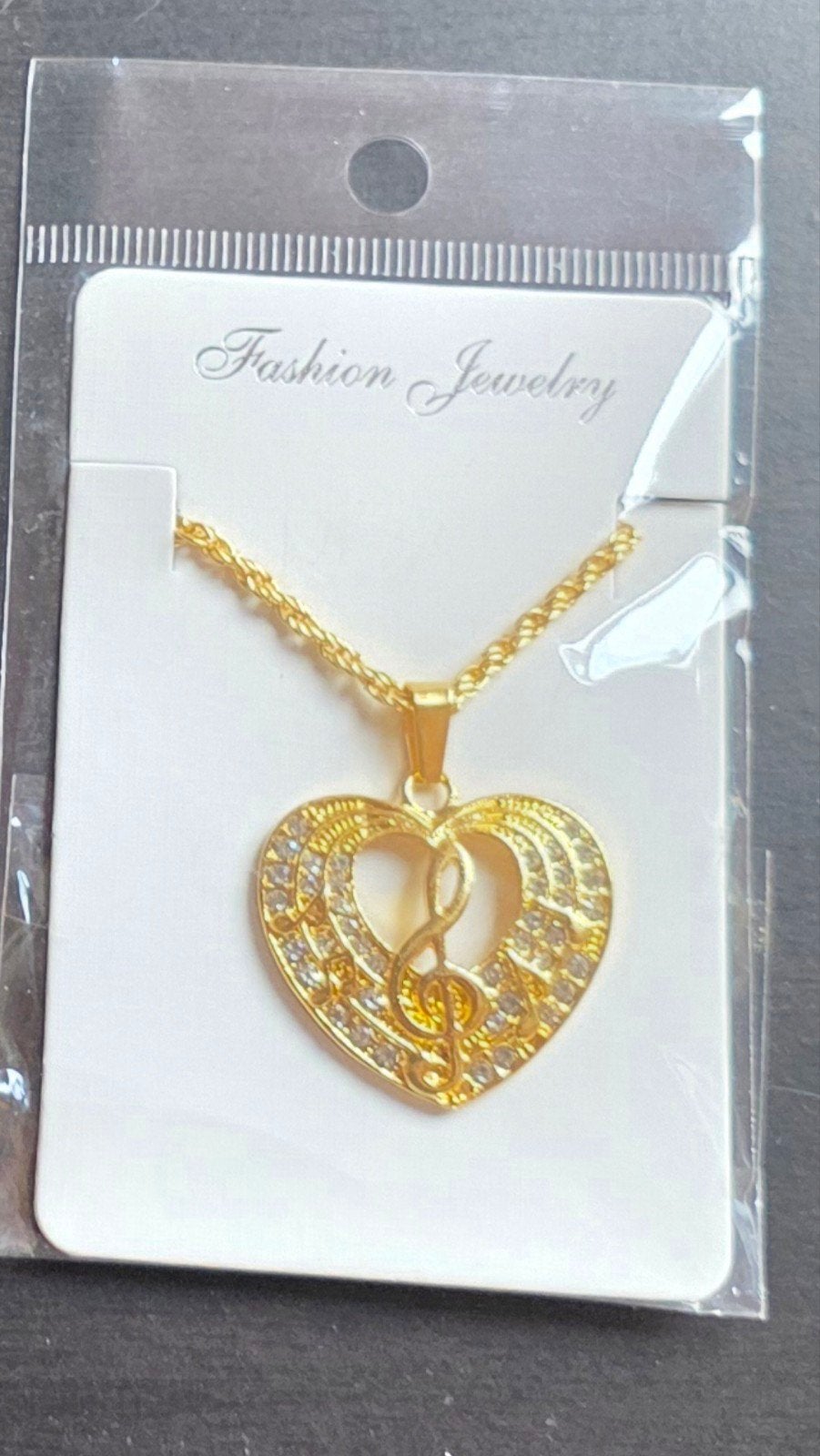 Goudkleurig ketting met Hartvormig hanger en Muzieknoot, Ophalen, Nieuw, Goud, Overige materialen
