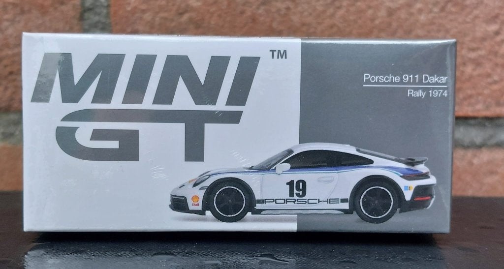 1/64 Porsche 911 (992) Dakar Rally Design Package 74, white, Hobby en Vrije tijd, Modelauto's | Overige schalen, Auto, Oudenbosch