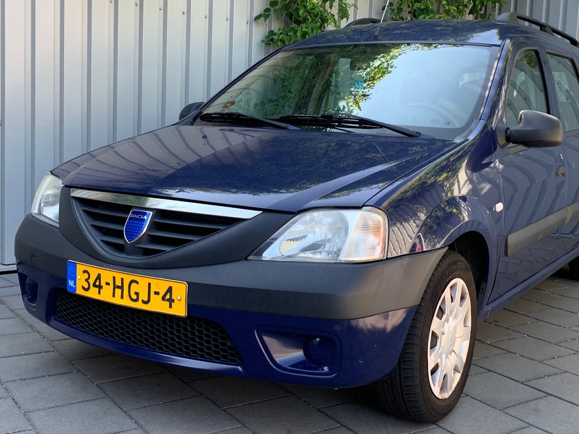 Dacia Logan MCV 1.6 Ambiance|7 Persoons|, Auto's, Stof, Gebruikt, Zwart, 4 cilinders