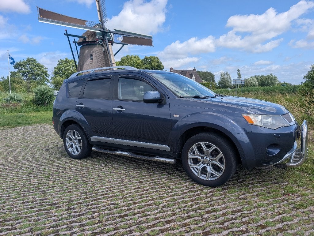 Mitsubishi Outlander 2.4 Intense+ 7zits,Leder,Carplay,Camera, Auto's, Mitsubishi, Lichtsensor, Outlander, Zwart, 4 cilinders