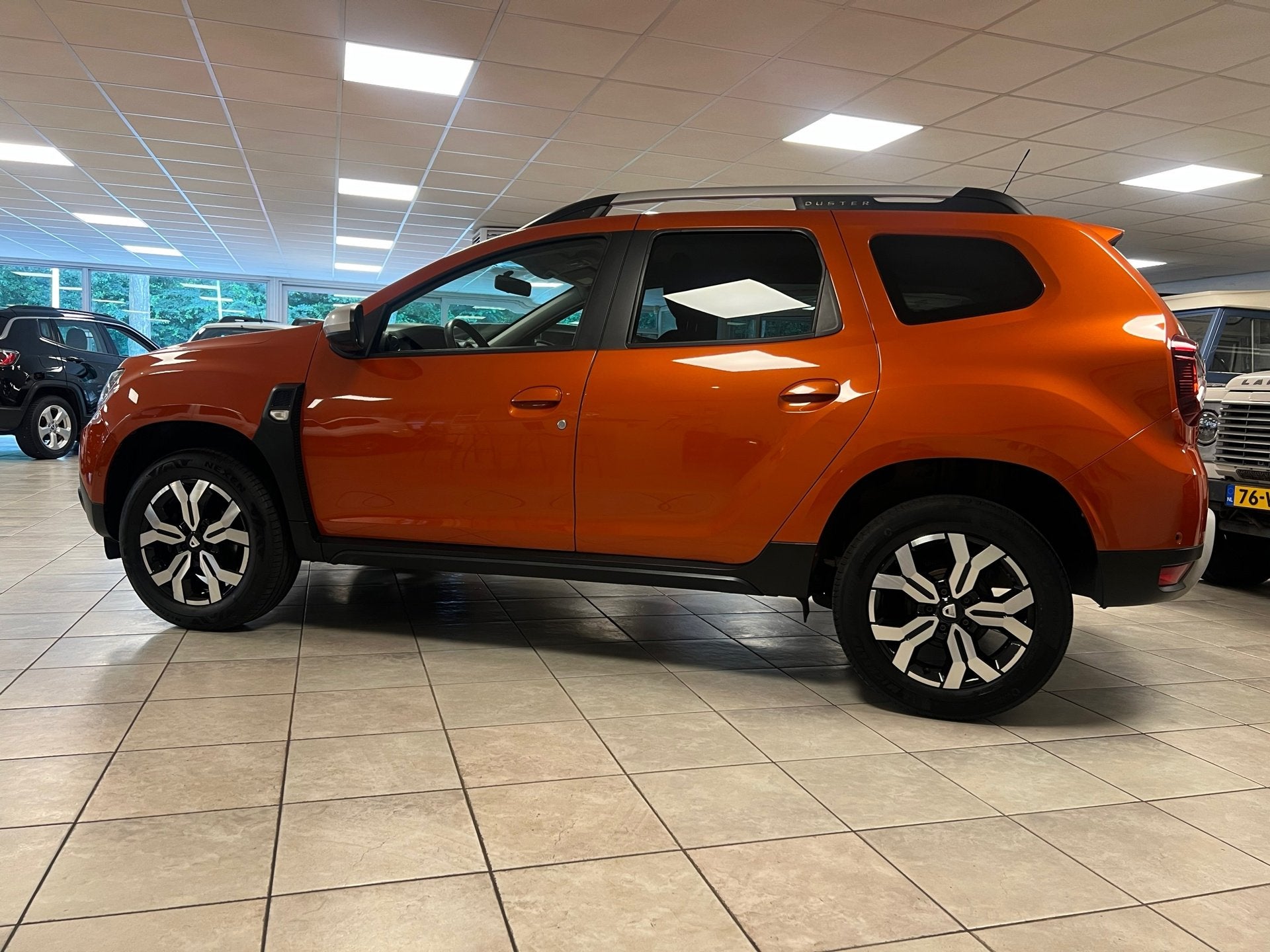 Dacia Duster 1.3 TCe Prestige, Auto's, Dacia, Stof, Gebruikt, Automatische klimaatregeling, 665 kg