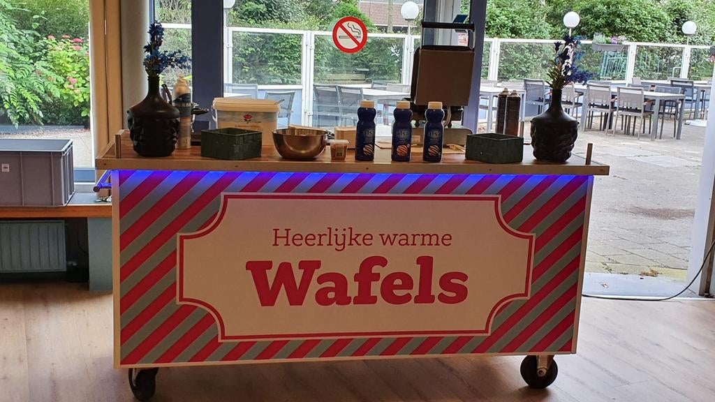 Wafelkraam, Ophalen