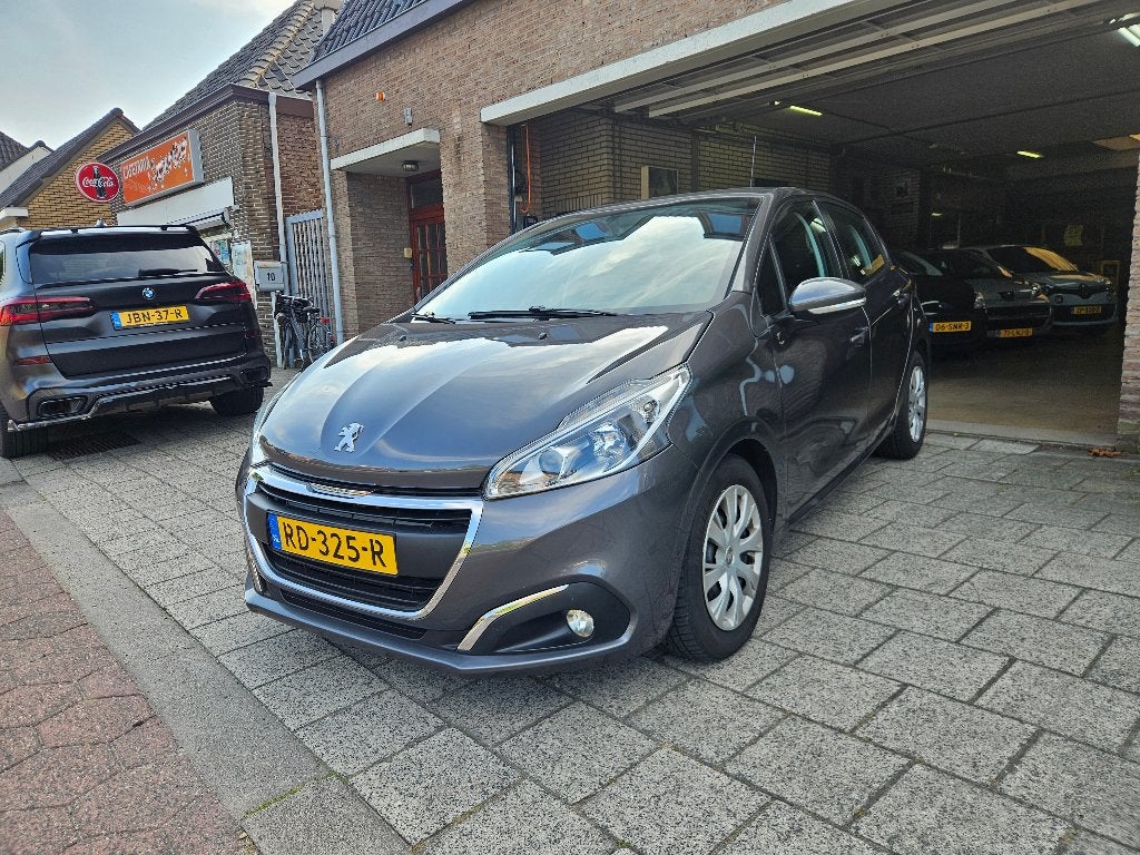 Peugeot 208 1.2 VTI 60KW/82PK 5-D 2017 Grijs, Voorwielaandrijving, Stof, 1199 cc, 23 km/l