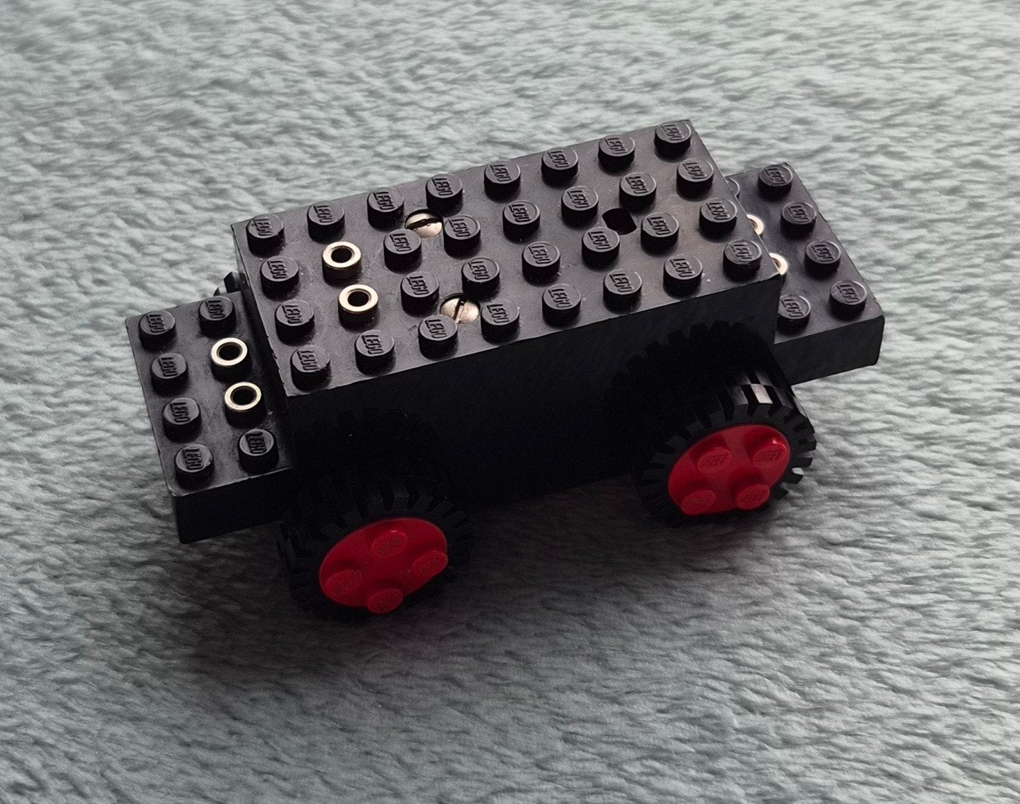 Lego 4,5 Volt (trein) motor met grof profiel banden., Ophalen of Verzenden, Gebruikt, Losse stenen, Lego