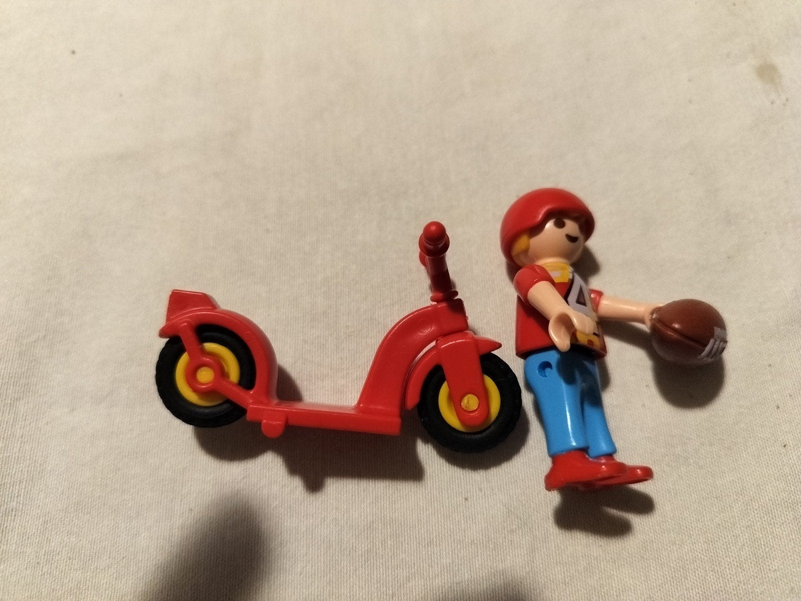 Playmobil figuur met step en American football, Ophalen of Verzenden, Zo goed als nieuw, Jongen of Meisje