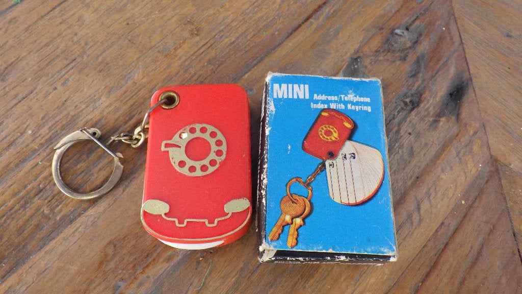 mooie retro sleutelhanger als adresboekje, Ophalen of Verzenden, Huis en Inrichting