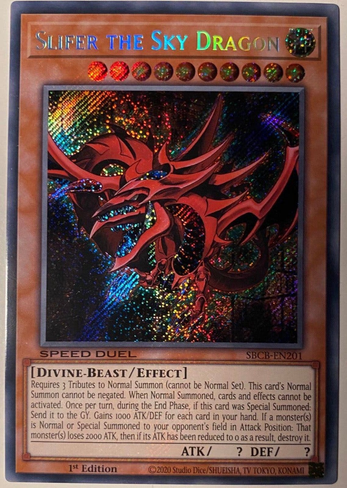 Yu-Gi-Oh! Slifer the Sky Dragon SBCB 1st Edition !, Ophalen of Verzenden, Zo goed als nieuw, Losse kaart, Foil
